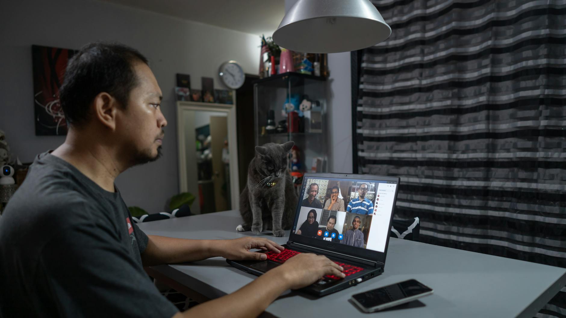a man having an online meeting
